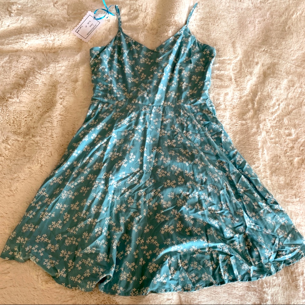 Gap turquoise floral dress white flowers size M.